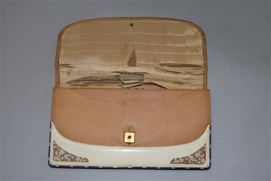 An Edwardian Regency style carved ivory and enamel purse